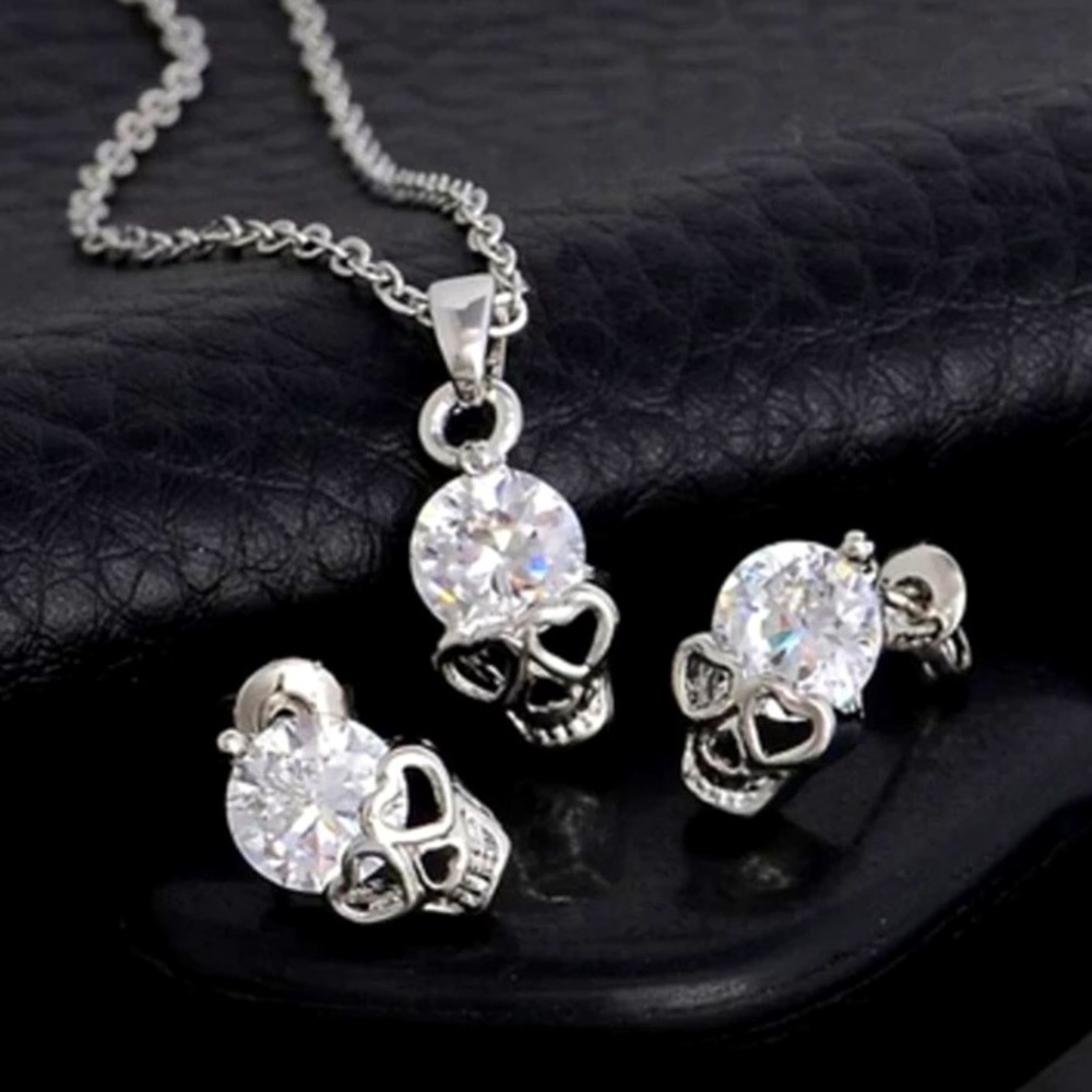 Skull earrings and necklace set. Great for gifting